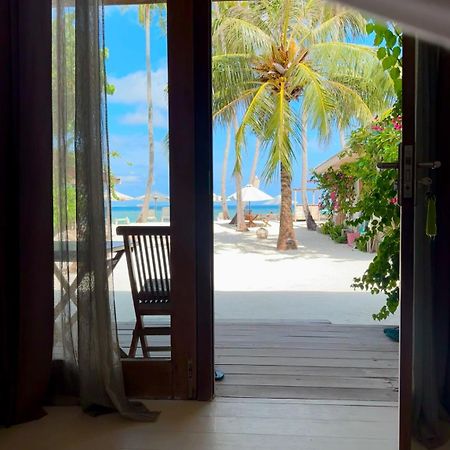 Met House Hotel Thulusdhoo Bagian luar foto